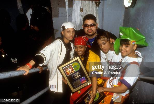 Eight D Rapper Rapper Heavy D appears in a photo taken with the group TLC when they ...