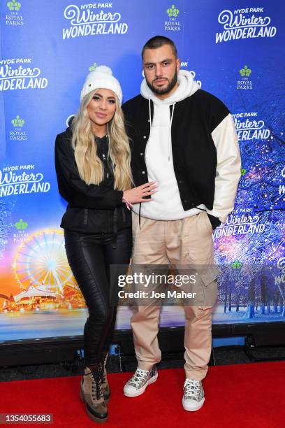 Paige Turley and Finn Tapp attend the VIP Preview evening of Hyde Park Winter Wonderland at Hyde Park on November 18, 2021 in London, England.