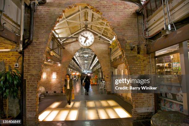 cracked openings in brick walls. - chelsea market new york stock pictures, royalty-free photos & images
