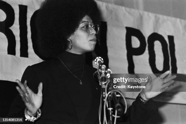 American political activist, Angela Davis, speaking at an anti-Apartheid rally at Friends House, Euston, London, 13th December 1974. Davis is in...