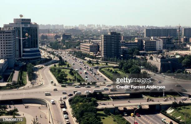 Elevated view , looking south, across Second Ring Road and Dongbianmen, Beijing, China, 1992.