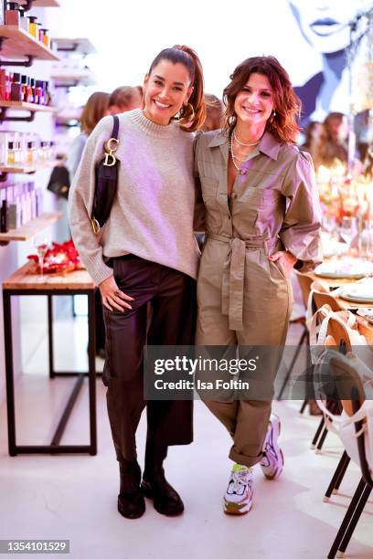 Jana Ina Zarrella and Marlene Lufen attend the Pre Christmas Dinner Ohhh de Cologne on November 16, 2021 in Cologne, Germany.