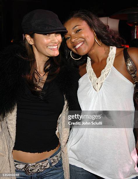 Kelly Hu and Gabrielle Union during Maxim 100th Issue Weekend - Poker Tournament in Las Vegas, Nevada, United States.