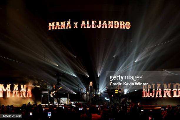 Juan Calleros, Fher Olvera, and Sergio Vallín of Maná and Alejandro Fernández perform onstage during The 22nd Annual Latin GRAMMY Awards at MGM Grand...