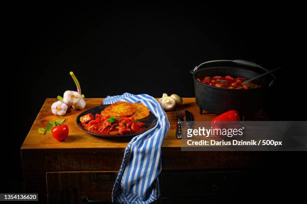high angle view of food on table against black background - soße 個照片及圖片檔