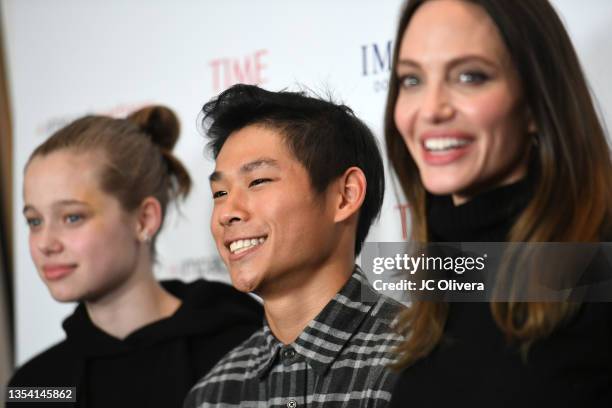 Shiloh Jolie-Pitt, Pax Thien Jolie-Pitt and actress Angelina Jolie attend the Los Angeles premiere of MSNBC Films' "Paper & Glue: A JR Project" at...