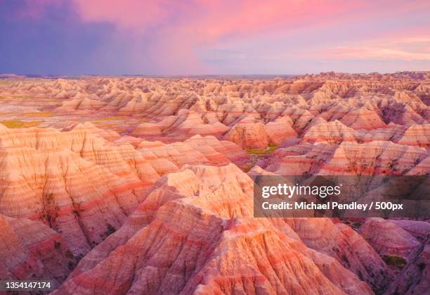 scenic view of rock formations against sky during sunset,badlands,united states,usa - badlands - fotografias e filmes do acervo