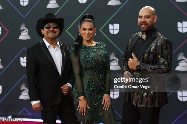 Univision Radio celebreties El Feo, La Mala, and El Bueno pose on the red carpet during the 22nd Annual Latin GRAMMY Awards at MGM Grand Garden Arena...