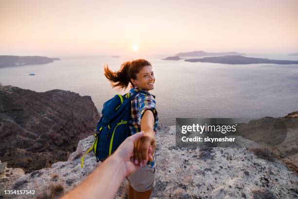 come with me honey! - tourist couple stock pictures, royalty-free photos & images