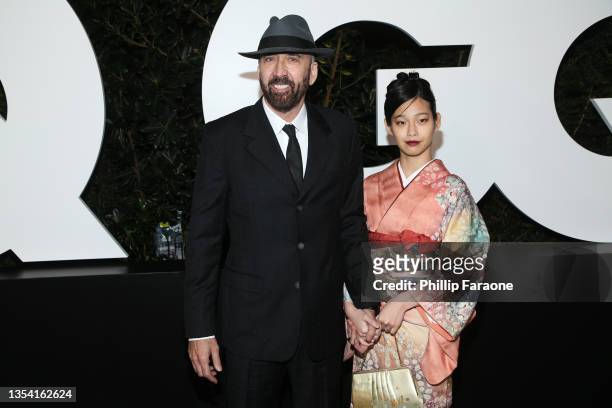 Nicholas Cage and Riko Shibata attend the GQ Men Of The Year Celebration on November 18, 2021 in West Hollywood, California.