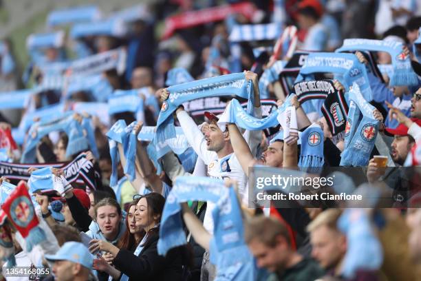 Fans cheer during the A-League match between Melbourne City and Brisbane Roar at AAMI Park, on November 19 in Melbourne, Australia.