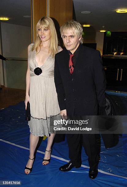 Meredith Ostrom and Nick Rhodes during London Fashion Week Autumn/Winter 2006 - Philip Treacy for Umbro - Backstage at Royal Horticultural Halls &...