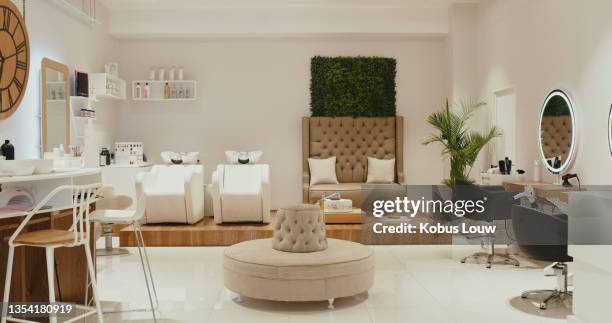 shot of the inside of an empty salon - beauty spa stockfoto's en -beelden