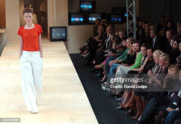 Laura Bailey and Jemima Khan and Sara Cox and Zoe Ball watching Topshop Unique Spring/Summer 2006