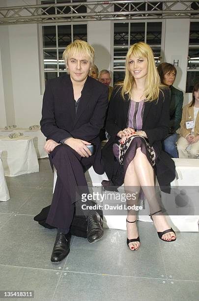 Nick Rhodes and Meredith Ostrom during London Fashion Week Autumn/Winter 2006 - Giles - Front Row at Victoria Square in London, Great Britain.