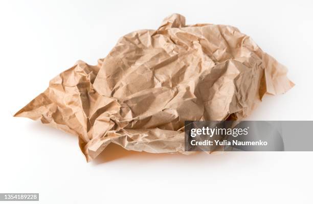 crumpled kraft paper. recycled beige natural paper - crumpled stock-fotos und bilder