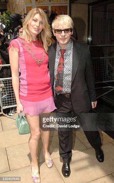 Meredith Ostrom and Nick Rhodes during The 50th Ivor Novello Awards - Arrivals at Grosvenor House Hotel in London, Great Britain.