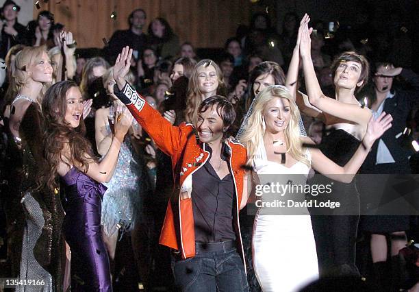 Julien MacDonald, designer and Paris Hilton during London Fashion Week Autumn/Winter 2006 - Julien MacDonald - Runway at Freemasons Hall in London,...