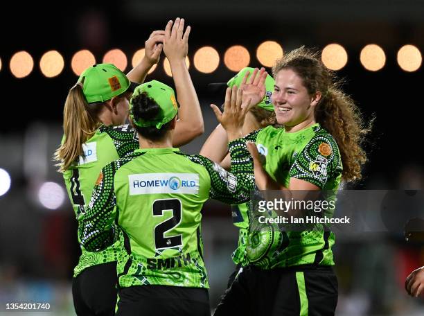 Hannah Darlington of the Thunder celebrates after taking the wicket of Mikayla Hinkley of the Heat during the Women's Big Bash League match between...