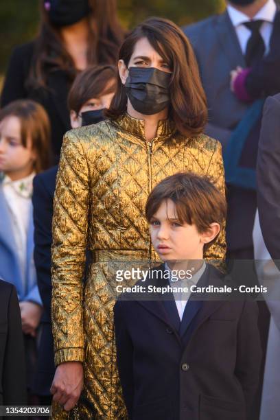 Charlotte Casiraghi and son Raphaël Elmaleh attend the Monaco National day celebrations in the courtyard of the Monaco palace on November 19, 2021 in...