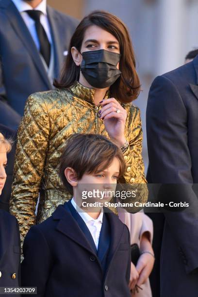 Charlotte Casiraghi and son Raphaël Elmaleh attend the Monaco National day celebrations in the courtyard of the Monaco palace on November 19, 2021 in...