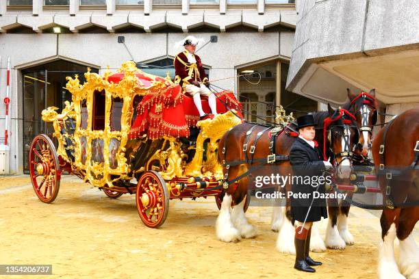 Driver David Lawless driver of the State Coach and the groom holding the Shire Horses prior to the 2021 Lord Mayor’s Show on November 13,2021 in...