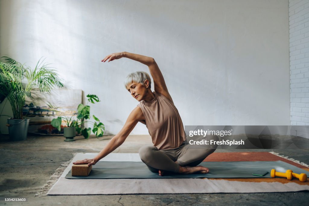 Senior Woman Doing Home Workout Training