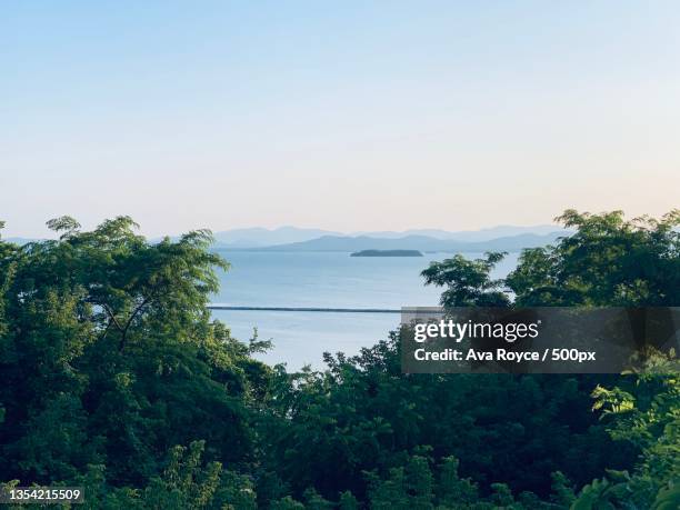 scenic view of sea against clear sky - ava hardy stock pictures, royalty-free photos & images