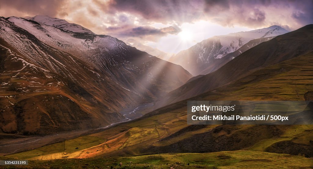 Scenic view of snowcapped mountains against sky during sunset,Azerbaijan