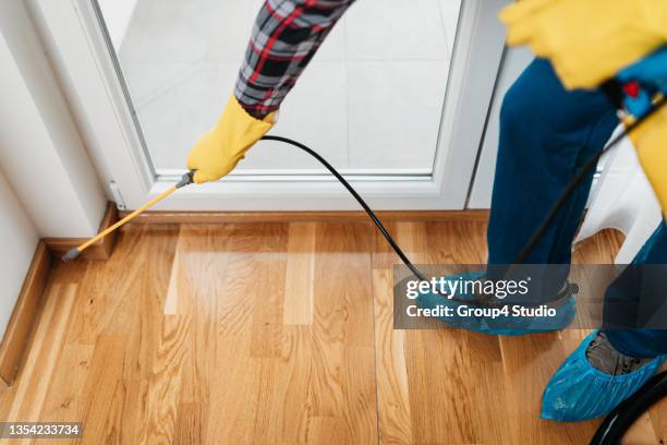 exterminator in workwear - pest stock pictures, royalty-free photos & images