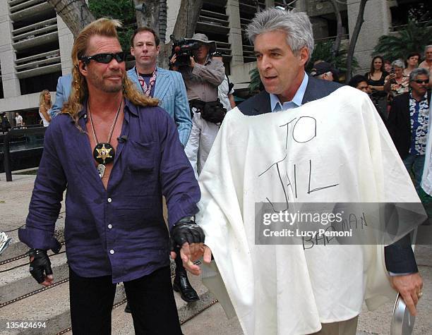 Duane "Dog" Chapman and a volunteer 'criminal' during March of Dimes Honolulu Fundraiser Featuring Duane "Dog" Chapman of "Dog The Bounty Hunter" -...