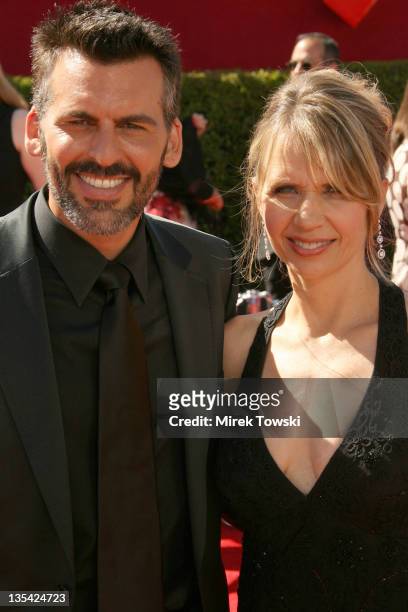 Oded Fehr and Rhonda Tollefson during 58th Annual Primetime Emmy Awards - Arrivals at Shrine Auditorium in Los Angeles, California, United States.