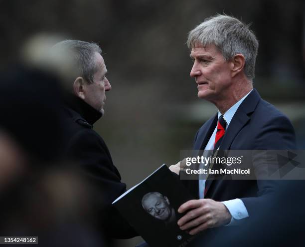 Former Rangers players Andy Goram and Richard Gough are seen leaving the memorial service for former Rangers manager Walter Smith at Glasgow...