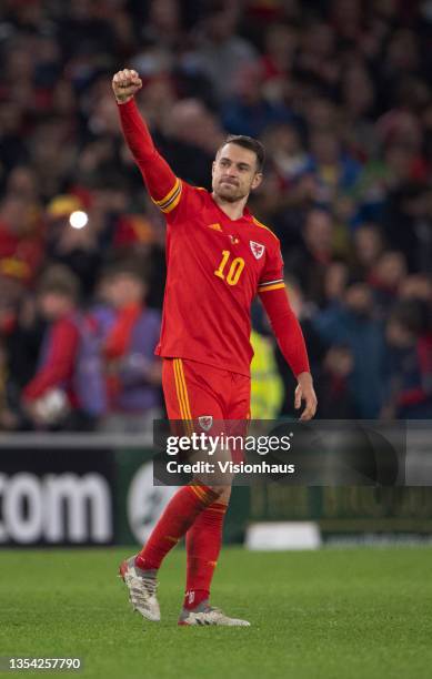 Aaron Ramsey of Wales celebrates at the final whistle after the 2022 FIFA World Cup Qualifier match between Wales and Belgium at Cardiff City Stadium...