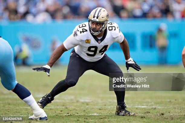 Cameron Jordan of the New Orleans Saints follows the offensive play during a game against the Tennessee Titans at Nissan Stadium on November 14, 2021...
