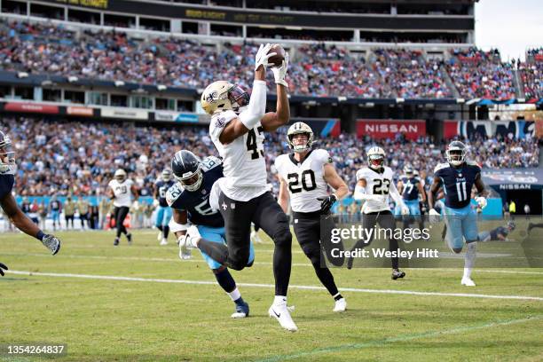 Marcus Williams of the New Orleans Saints intercepts a pass in the end zone that is called back by a penalty during a game against the Tennessee...