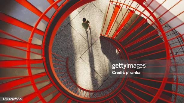 office building staircase - red flag stock pictures, royalty-free photos & images