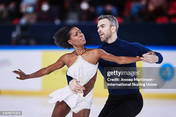 Vanessa James and Eric Radford of Canada compete in Pairs Short Program during the ISU Grand Prix of Figure Skating - Internationaux de France at...