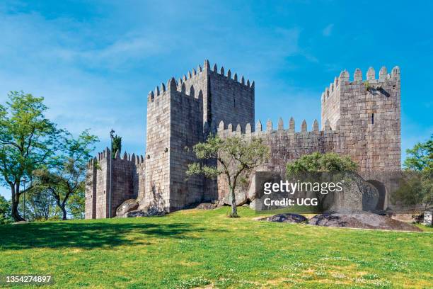 Guimaraes, Braga District, Portugal. Castelo de Guimaraes or Guimaraes Castle. Founded in the 10th century and known as the Cradle of Portugal. The...