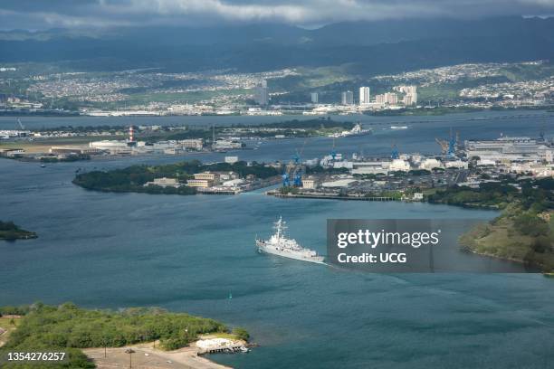 Aerial view of Honolulu Hawaii with Ford Island in the middle. And the Naval station Pearl Harbor.