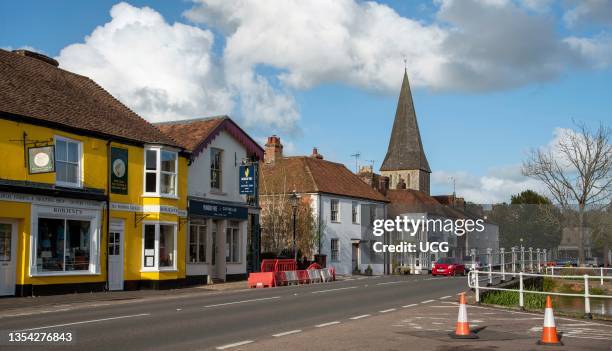 Stockbridge, Hampshire, England, UK, Stockbridge main street with colorful buildings where drovers drove their sheep and cattle. One of the smallest...