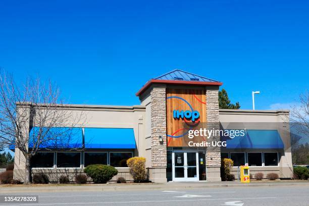 International House of Pancakes restaurant entrance showing IHOP logo, Spokane Valley, Washington mall, a multinational pancake house headquartered...