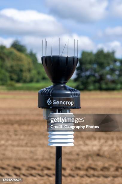 Sencrop Raincrop V14 agricultural weather station equipment in farm field, Sutton, Suffolk, England, UK.