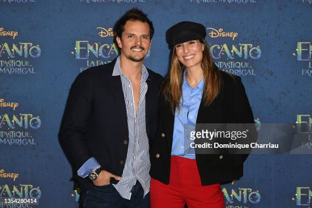 Juan Arbelaez and Laury Thilleman attend the "Encanto" - Paris Gala Screening at Le Grand Rex on November 19, 2021 in Paris, France.