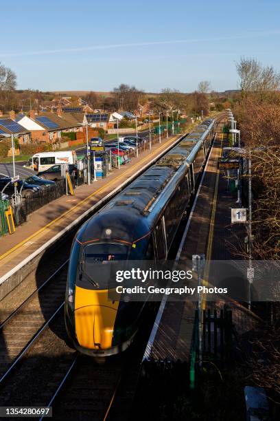 Great Western Railway passenger train, Bedwyn railway station, Great Bedwyn, Wiltshire, England, UK.