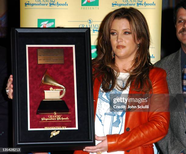 Lisa Marie Presley during The GRAMMY Foundation in Partnership with 7 UP Names Long Beach Polytechnic High School A Gold Grammy Signature School at...