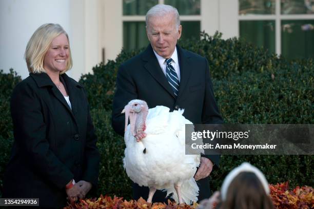 President Joe Biden pardons Peanut Butter the turkey during the 74th annual Thanksgiving turkey pardoning in the Rose Garden of the White House on...