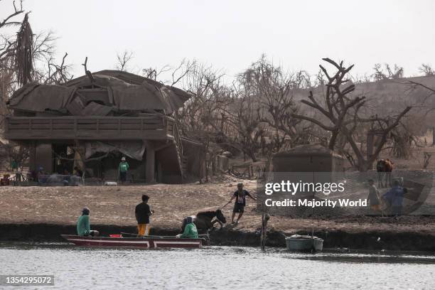 Residents save animals and their belongings from their homes covered in ash as Taal volcano contnues to show signs of an imminent hazardous explosion...