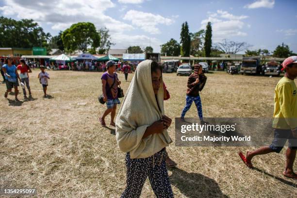 Residents living on the Taal volcano island flee using boats as Taal volcano continue to spew smoke and ash in Laurel, Batangas province south of...