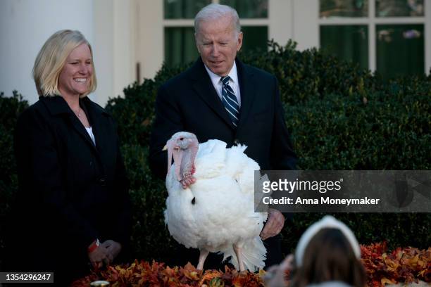 President Joe Biden pardons Peanut Butter the turkey during the 74th annual Thanksgiving turkey pardoning in the Rose Garden of the White House on...